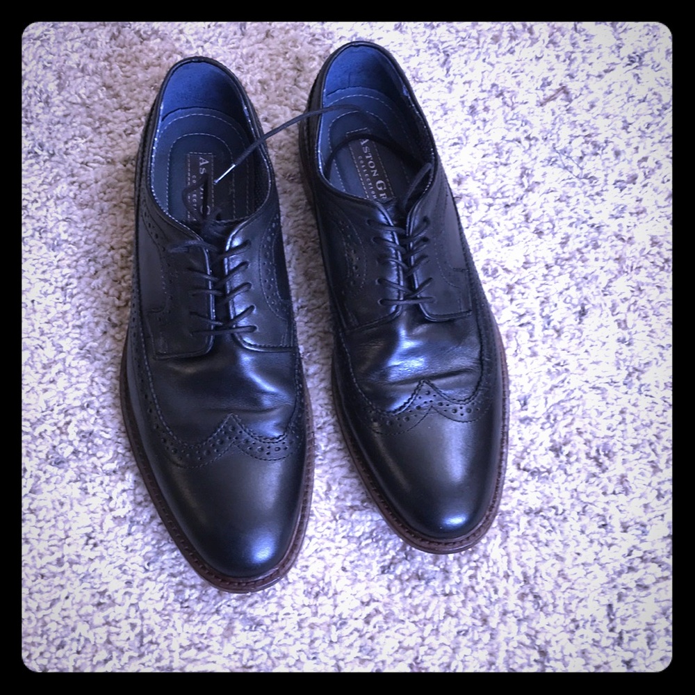 Black wingtip shoes